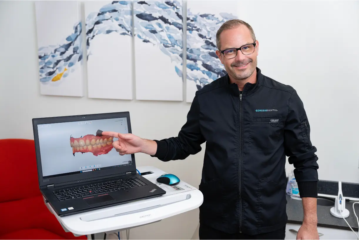 Dr. Leedy explaining digital dentures to a patient in Cary